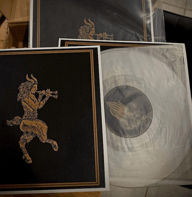 Simply Dust sleeve beside the translucent lathe-cut record